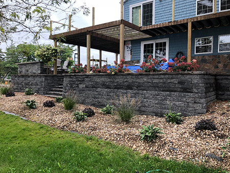 Tumbled PreCast Retaining System Under Deck